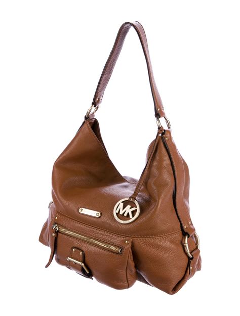 are all michael kors bags real leather